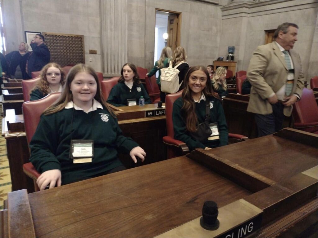 children sitting at a desk